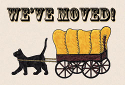 Cat pulls covered wagon